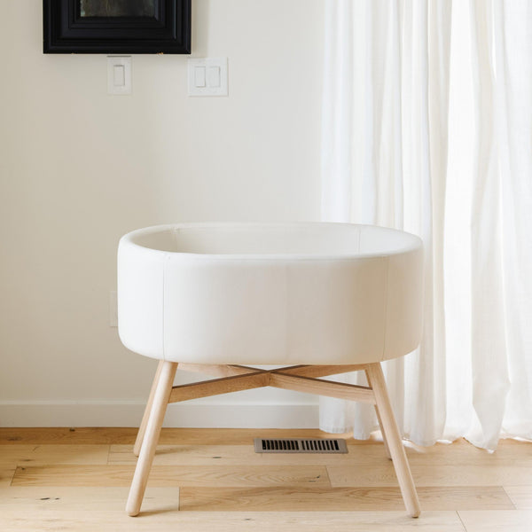 M26834GYLB,Babyletto,babyletto x GATHRE Capsule Bassinet in Ivory